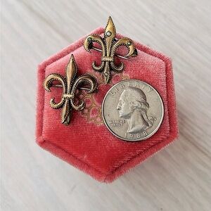 Duo of antique French fleur de Lis pins